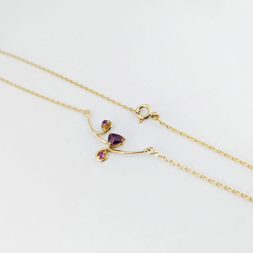 Collier Collier - Pendentif floral en or jaune 18 carats et rubis 58 Facettes 32891