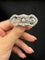 Broche Spilla « Qualcosa di Blu » Art déco en platine, diamants et saphirs 58 Facettes spilla zaffiri