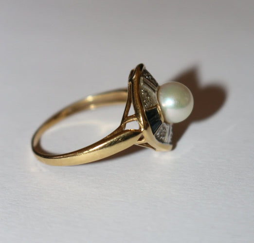 Bague 53 Bague losangique en or jaune 18 carats, saphirs, perle et diamants 58 Facettes 605