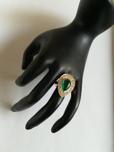 Bague 54 Bague marquise en or jaune, émeraude et diamants 58 Facettes 01347
