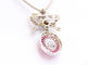 Collier Collier avec pendentif-broche nœud pavé de diamants et rubis 58 Facettes MT240099
