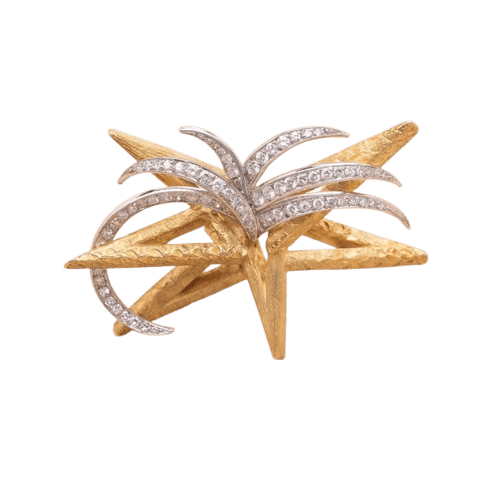 Broche Boucheron Starlight - Broche étoile en or jaune et platine diamants 58 Facettes 793350