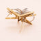 Broche Boucheron Starlight - Broche étoile en or jaune et platine diamants 58 Facettes 793350