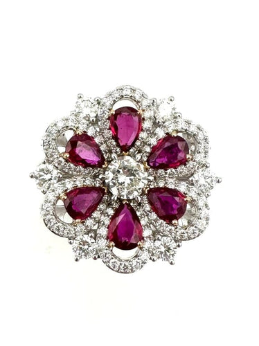 Bague 60 Mouawad - Bague marguerite en or blanc 18K, diamants et rubis 58 Facettes MOUAWAD Bague
