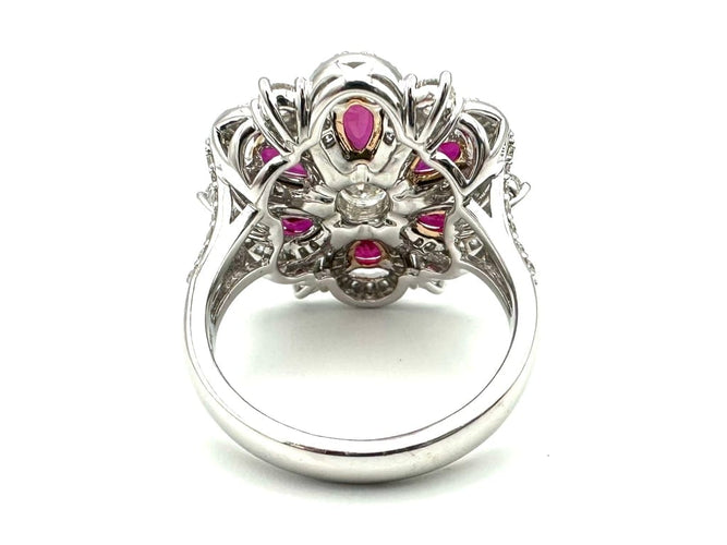 Bague 60 Mouawad - Bague marguerite en or blanc 18K, diamants et rubis 58 Facettes MOUAWAD Bague
