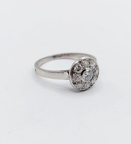 Bague 53 Bague marguerite Art déco en platine et diamants 0,55 ct 58 Facettes A06699