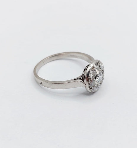 Bague 53 Bague marguerite Art déco en platine et diamants 0,55 ct 58 Facettes A06699