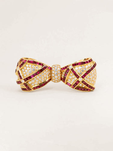 Broche Broche noeud or jaune rubis diamants 58 Facettes 1242.3