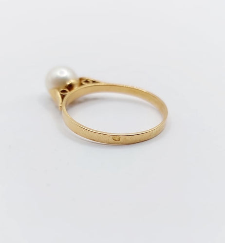 Bague 50 Bague Art déco en or rose 18k ornée d'une perle 58 Facettes A06713