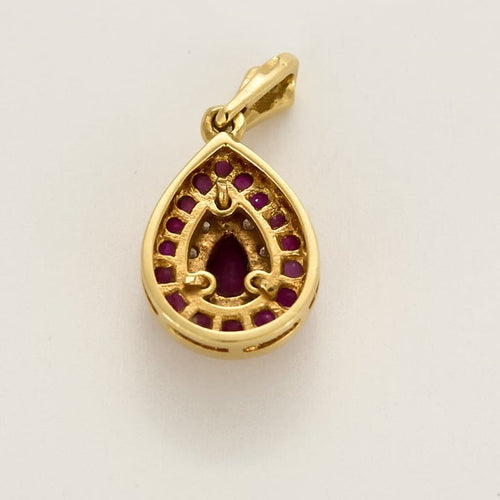 Pendentif Pendentif en or jaune, diamants, rubis 58 Facettes B260094