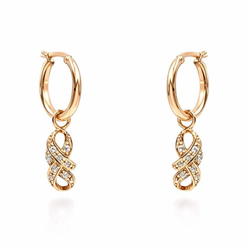 Boucles d'oreilles Boucles d’oreilles en or rose 18 carats serties de diamants 58 Facettes Boucles d’oreilles en or rose 18K serties de diamants