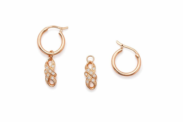 Boucles d'oreilles Boucles d’oreilles en or rose 18 carats serties de diamants 58 Facettes Boucles d’oreilles en or rose 18K serties de diamants