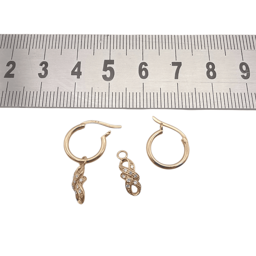 Boucles d'oreilles Boucles d’oreilles en or rose 18 carats serties de diamants 58 Facettes Boucles d’oreilles en or rose 18K serties de diamants