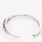 Bracelet Bracelet jonc ouvrant rubis et diamants en or blanc 750 58 Facettes LP1345/