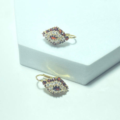 Boucles d'oreilles Boucles d'oreilles - Or jaune 18 carats (750) avec pierres rouges et blanches 58 Facettes 260095