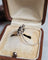 Bague 56 Bague marguerite vintage en or blanc 18 carats, saphir et diamants 58 Facettes 660
