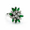 Bague 56 Bague fleur en or blanc 18 ct, diamants et émeraudes 58 Facettes 50258
