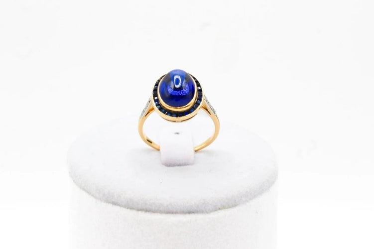 Bague 53 Bague cabochon en or jaune 750 et platine, saphir et diamants 58 Facettes 250101