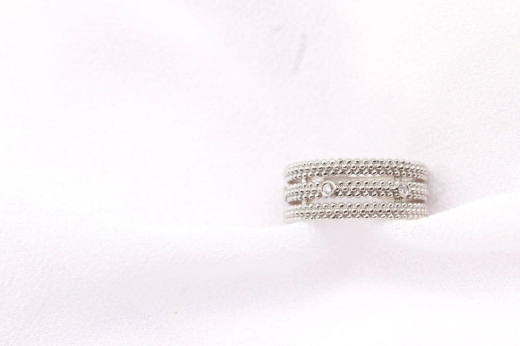 Bague 52 Mauboussin Le Premier Jour - Bague 3 anneaux perlés en or blanc et diamants 58 Facettes 250354
