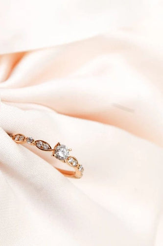 Bague 50 Bague solitaire en or rose 750 avec diamants 0,10 ct 58 Facettes 240315