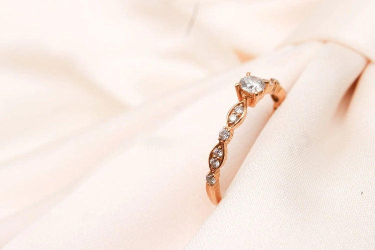 Bague 50 Bague solitaire en or rose 750 avec diamants 0,10 ct 58 Facettes 240315