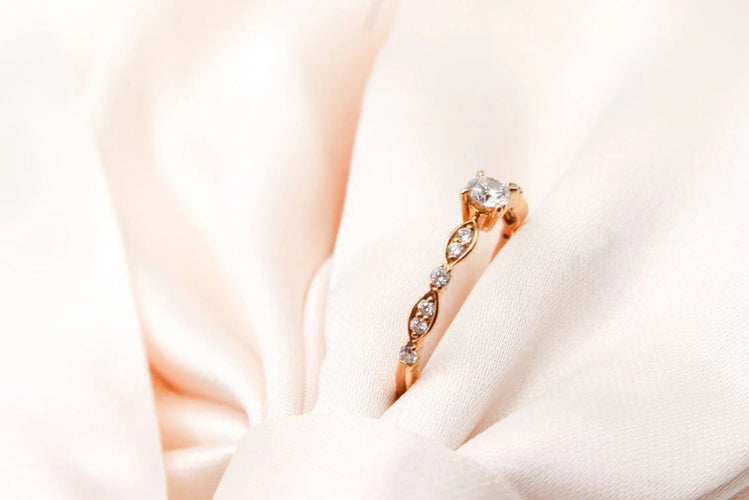 Bague 50 Bague solitaire en or rose 750 avec diamants 0,10 ct 58 Facettes 240315