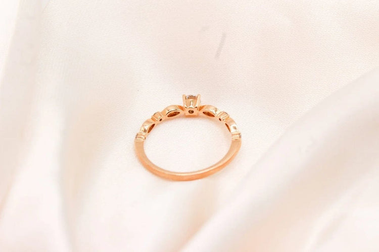 Bague 50 Bague solitaire en or rose 750 avec diamants 0,10 ct 58 Facettes 240315