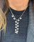 Collier Collier à motifs en or blanc 18 carats et diamants 58 Facettes Col
