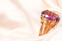 Bague 54 Bague motif corde en or jaune 750 sertie d’une améthyste 58 Facettes 250317