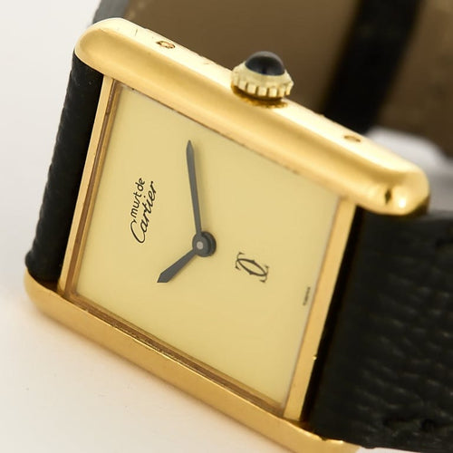 Montre Cartier Tank Must - Montre en argent plaqué or, cadran muet crème 58 Facettes A1163.