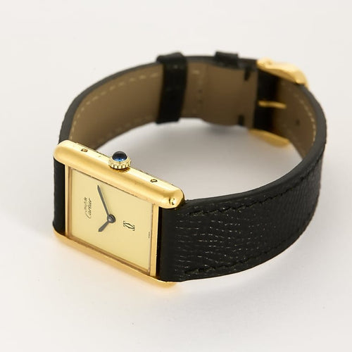 Montre Cartier Tank Must - Montre en argent plaqué or, cadran muet crème 58 Facettes A1163.