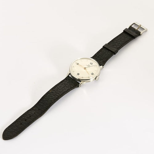 Montre Omega - Montre en acier réf. 2324/10 cadran blanc chiffres arabes 58 Facettes A0932