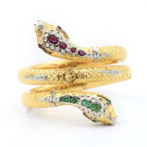 Bracelet Bracelet serpent Tubogas en or jaune serti de diamants, de rubis et d'émeraudes 58 Facettes 22478