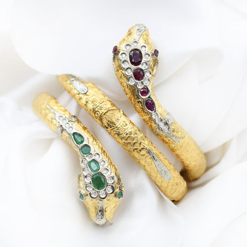 Bracelet Bracelet serpent Tubogas en or jaune serti de diamants, de rubis et d'émeraudes 58 Facettes 22478