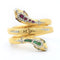 Bracelet Bracelet serpent Tubogas en or jaune serti de diamants, de rubis et d'émeraudes 58 Facettes 22478