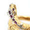 Bracelet Bracelet serpent Tubogas en or jaune serti de diamants, de rubis et d'émeraudes 58 Facettes 22478