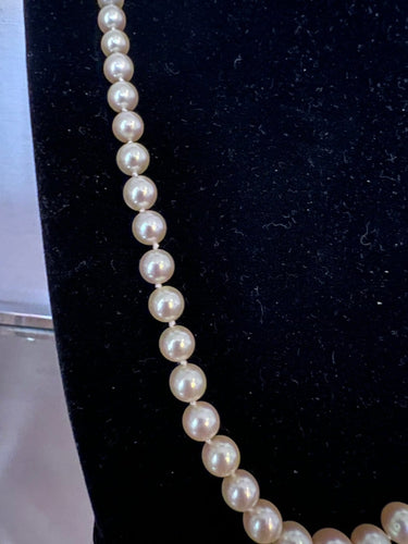 Collier Collier 77 perles de culture en chute, fermoir en or gris 18K et diamants 58 Facettes 887