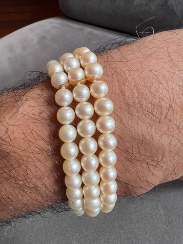 Bracelet Bracelet 3 rangs perles de culture en or 18K 58 Facettes 933
