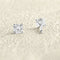 Boucles d'oreilles Alpha - Puces d'oreilles en or blanc et diamants 58 Facettes 66000167