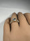 Bague 55 Bague ajourée en or jaune et or blanc 18 carats, topaze et diamants 58 Facettes 279