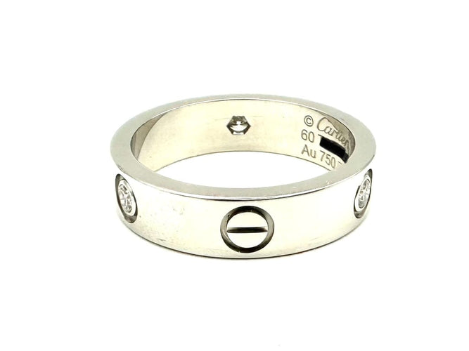 Bague 60 Cartier Love Classique - Bague en or blanc et diamants 58 Facettes CARTIER Bague