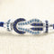 Bracelet Bracelet sur câble FRED Chance Infini MM Or blanc, saphirs, topazes bleues 58 Facettes OC-66000249
