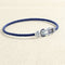 Bracelet Bracelet sur câble FRED Chance Infini MM Or blanc, saphirs, topazes bleues 58 Facettes OC-66000249