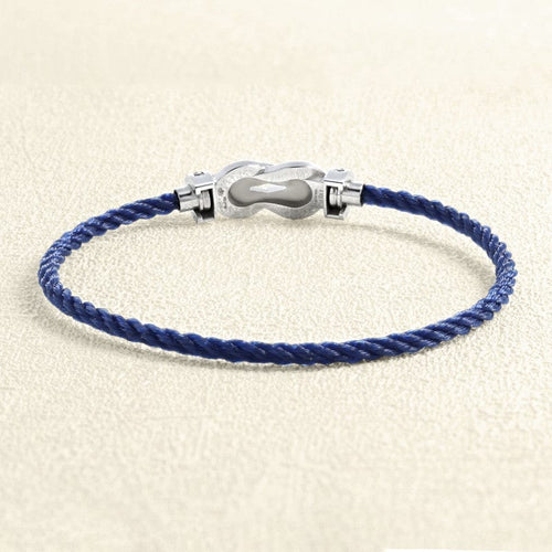 Bracelet Bracelet sur câble FRED Chance Infini MM Or blanc, saphirs, topazes bleues 58 Facettes OC-66000249