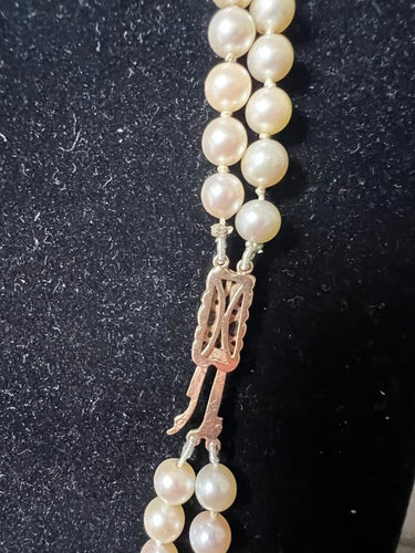 Collier Collier double rang de perles Akoya avec fermoir en or jaune, grenats et diamants 58 Facettes 933