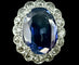 Bague 54 Bague sertie d’un saphir ovale 7 ct et diamants en or blanc 18 carats 58 Facettes Bague 12