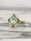 Bague 55 Bague en or jaune 18K avec tourmaline, diamants et tsavorites 58 Facettes 241