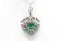 Pendentif Pendentif cœur en or blanc avec émeraude et diamants 58 Facettes 240165