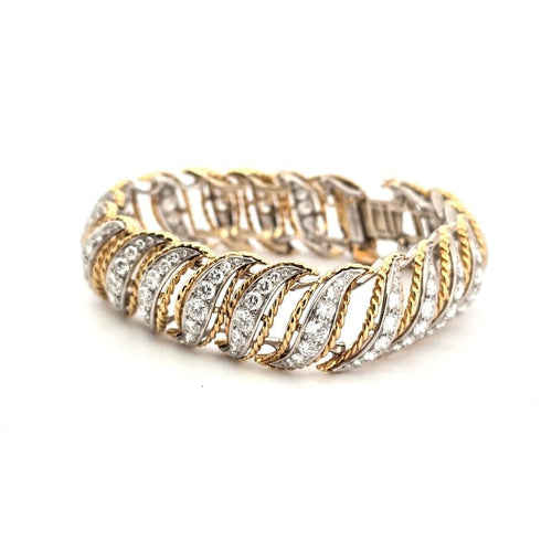 Bracelet Bracelet années 1940-1950 en platine et or avec diamants 58 Facettes 34/26 E