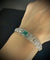 Bracelet Bracelet Art déco en platine et or blanc, émeraude et diamants 58 Facettes Bracelet 11
